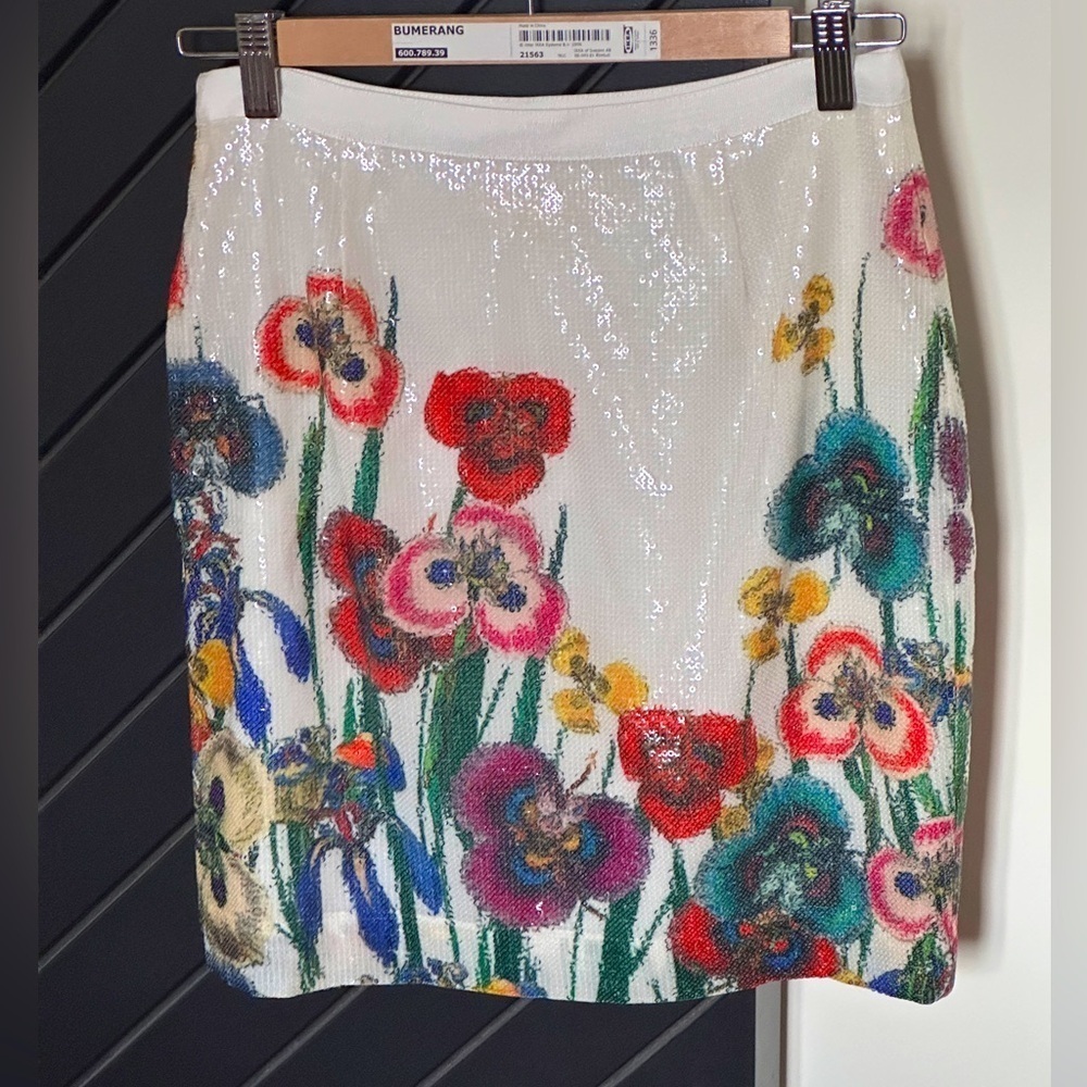 NWOT!! Beautiful floral sequins skirt. Never worn without tags!!